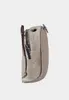 A side view of a small beige coin purse with a zipper. Produktbild-Vorschau