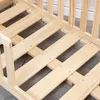 Close-up view of the wooden slats of a bed frame. Anteprima dell’immagine prodotto