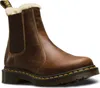 A single brown Chelsea boot with faux fur lining, shown from a side-angle against a white background. Produktbild-Vorschau