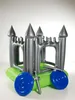 An inflatable castle with accessories on a white background. Produktbild-Vorschau