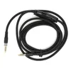 A black audio cable with 3.5mm connectors and an in-line volume control, laid out on a white background. Náhľad obrázku produktu
