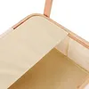 Close-up view of a fabric basket with wooden accents Anteprima dell’immagine prodotto