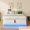 A bedroom scene featuring a white bed with green bedding and pillows. Voir les images du produit