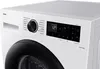 Close-up of the control panel and top of a white Samsung washing machine. Produktbild-Vorschau