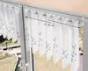Curtains hanging on a window rod, with a measurement indicator. Produktbild-Vorschau