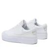 A pair of white Nike Court Legacy Lift sneakers shown from a rear-side angle against a white background. Náhled obrázku produktu