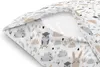 A close-up view of a pillow with a cute animal pattern. Produktbild-Vorschau
