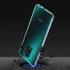A clear phone case is shown on a dark background, with debris flying around it, suggesting it is protective. Anteprima dell’immagine prodotto