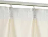 A close-up view of cream-colored curtains hanging from a curtain track. Produktbild-Vorschau