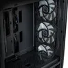 Close-up view of the interior of a computer case, showing three fans and internal wiring. Produktbild-Vorschau