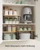 Kitchen cabinet interior with shelves displaying kitchenware and appliances. Produktbild-Vorschau