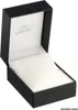 An open black watch box with a white cushion inside. Produktbild-Vorschau