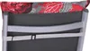 Close-up of the back of a reclining chair with a floral cushion. Produktbild-Vorschau