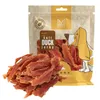 A bag of dog treats with some treats spilled in front of it. Produktbild-Vorschau