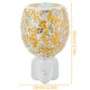 A mosaic glass plug-in night light diffuser. Produktbild-Vorschau