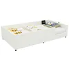 A white upholstered bed with a white mattress, yellow patterned bedding, and a striped pillow. A small black device with a green circle is attached to the headboard. Anteprima dell’immagine prodotto