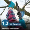 A person is using a mini chainsaw to cut a tree branch. Produktbild-Vorschau