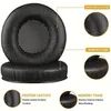 Close-up of black headphone ear pads with text overlays describing their materials and features. Produktbild-Vorschau