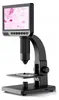 A digital microscope with an LCD screen is shown against a white background. Náhled obrázku produktu