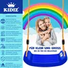 A mother and daughter are smiling and hugging on a swing set with a rainbow in the background. The image also features text describing the product's features. Produktbild-Vorschau