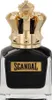 A close-up studio shot of a black perfume bottle with a gold crown-shaped cap. Náhľad obrázku produktu