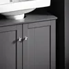 A close-up view of a gray bathroom vanity cabinet with two doors and crystal knobs, beneath a white sink. Produktbild-Vorschau
