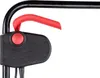 A close-up view of a red lever and a black control panel with a red button on a black handle. Produktbild-Vorschau