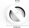 A white circular object with a black inner ring and cutouts, with dimension lines and text indicating its size.