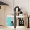 A two-tiered bathroom organizer with various cosmetic products on display. Náhľad obrázku produktu