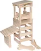 A tower built from wooden blocks, with some loose blocks scattered around the base. Produktbild-Vorschau