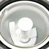 Close-up view inside of an ice cream maker bowl with the paddle attachment. Náhled obrázku produktu