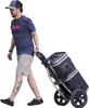 A man is pulling a shopping trolley with a cooler bag attached. Produktbild-Vorschau