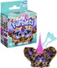 A Furby Furblet toy and its packaging are displayed. Produktbild-Vorschau