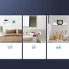 Collage of three scenes showing a smartphone wall mount being used in a bedroom, bathroom, and kitchen. Produktbild-Vorschau