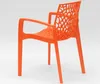 An orange plastic chair with a patterned back and seat, shown from a side angle against a white background. Anteprima dell’immagine prodotto
