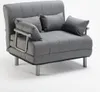 A gray fabric sofa bed with two pillows on a white background. Produktbild-Vorschau