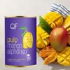 A can of mango pulp is shown next to fresh and dried mangoes. Náhľad obrázku produktu