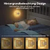 A child sleeping in bed with a night light plugged into the wall. Produktbild-Vorschau