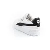 A white Puma sneaker with black accents is shown from a side-angle on a white background. Voir les images du produit