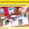 A child's hands are arranging photos in a scrapbook, with text overlaying the top of the image. Náhled obrázku produktu