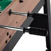 A close-up view of the handles and rods of a foosball table. Náhľad obrázku produktu
