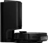 A black robot vacuum cleaner docked in its charging station, shown from a side profile against a white background. Náhled obrázku produktu