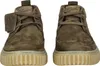 A pair of brown Clarks Torhill LaceHi sneakers are shown from the front against a white background. Produktbild-Vorschau