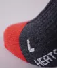 A close-up shot of a sock, showing the toe cap and part of the leg. Produktbild-Vorschau