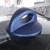A close-up view of a blue pot lid handle on a glass lid. Produktbild-Vorschau