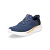A single blue sneaker with white and gold accents is shown against a white background. Voir les images du produit