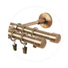 A close-up view of a double curtain rod with rings and clips. Anteprima dell’immagine prodotto