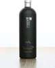 A bottle of Tatratea 52 Original 700ml 52% Vol. is displayed on a wooden surface against a white background. Produktbild-Vorschau