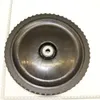 A black wheel with a bearing in the center, placed on a white background with a ruler along the bottom and left side. Produktbild-Vorschau