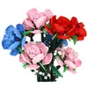 A bouquet of artificial flowers made of building blocks, in various colors, arranged in a vase. Náhľad obrázku produktu